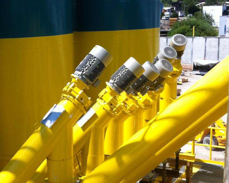 A group of yellow pipes

Description automatically generated